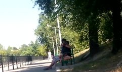 Guy fucks a girl in public on a bench
