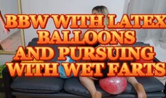 Mistress Atenna Shelby Bursting her submissive's latex balloons with farts and big ass