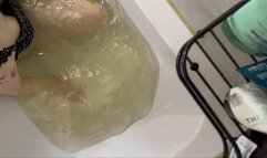 Emma in the bath, deep breath, no hands and no bubbles