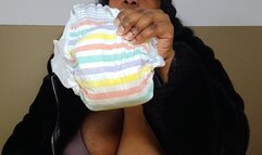 Naughty boy gets caught wearing a diaper