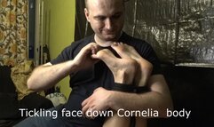Tickling face down Cornelia body