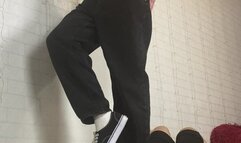 Hard trample in My Vans sneakers on tied and blinded human rug (vertical view)