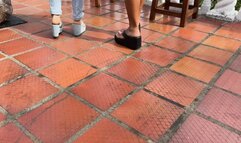 Dalilah and her friend have fun on the terrace and play with their feet
