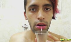 Filling a cup with spit and Jerking off