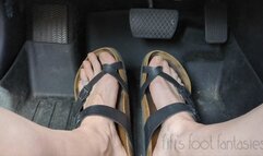 Fifi pedal pumping in Birkenstocks in a store parking lot replay