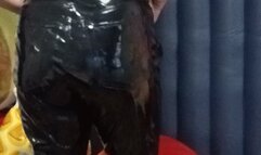 girl in latex and heels jumping on yoga ball