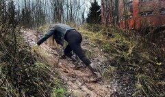Sexy Nina in Rubber boots climbing on the slope, rubber boots in mud, hunter boots on muddy slope