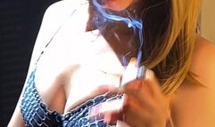 A close up angle of me trying on my new lingerie and smoking a long all white ;) xx