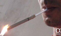 Smoking Muratti red 100s with glass holder 010824