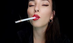A closeup shot of smoking Marlboro Gold cigarette with bright red lipstick on : Miss Sara
