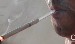 Smoking Muratti red 100s with glass holder 010824 Slowmotion