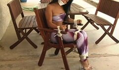 Gwen Stanley didn't approve of Reina's clothing so she left the Asian beauty bound and gagged on the patio!