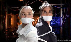 Bonnie & Scarlett in: Mmmpphing Woo-Sters Back in the Saddle: Beauties in Big Danger as Mad Scientist Reclaims the Resourceful Houdini-Bimbettes! (HD)