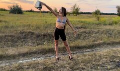 Pours motor oil onto the ground (custom video)