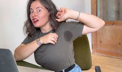 she is ashamed of her sweat marks on her t-shirt