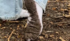 Getting my feet and white socks very dirty in the woods