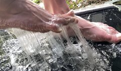 Bare feet struggling in sticky superglue trap