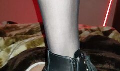 Trampling with boots on the stomach