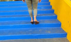 Diana Senior walking on flip flops in the Stadium