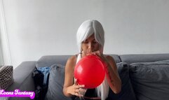 Akina blows 20 balloons