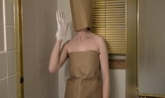 Paper bags and knee high socks in the shower getting wet