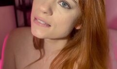 Beautiful redhead with natural breasts, smooth pussy, anal plug, smokes some cigarettes while trying to make someone horny