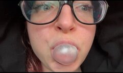 Emma makes bubble gum bubbles in a taxi