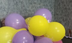 girl in sweety swimsuit nailpop and sittopop balloons