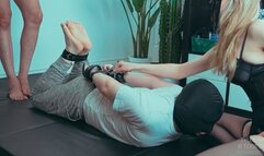 Bullied by Imilia and FeetofJason's feet while hogtied!