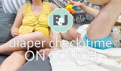 Diaper check time on couch