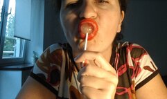 Cherry lollipop and red lips