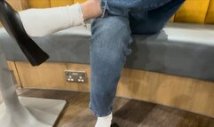 Shoeplay and dangling in ballet flat shoes and white socks in public