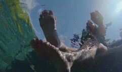 “You can come up for air after you worship my feet!” Raven Lynette pushes you in the pool