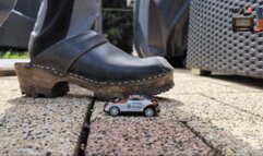 Sheet metal Cars under my cruel wooden Clogs