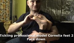 Tickling professional model Cornelia 2 face down