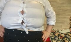 A very tight shirt is about to be ripped