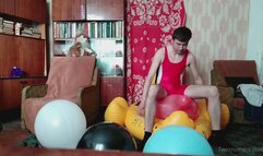 Eugene pop big balloons on inflatable duck