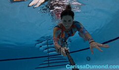 Carissa swimming barefoot and in a Fashion Nova dress (pool version)