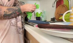 Dishwashing In Green Latex Gloves