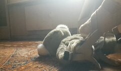 SLAMMING HER PLUSH FRIEND WITH HER FLAT SLIPPERS