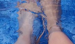 Cooling off my feet in the pool
