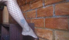 Roxan with her beautiful crossed legs and bare feet wearing fishnet stockings (3)
