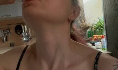 Emma shows her neck and drinks water, cooks, moves her neck smoothly - part two