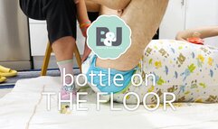 Bottle on the floor