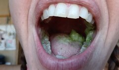 Lania eats a green apple