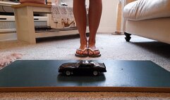 Back by popular demand GIANTESS Charn crushes a Pontiac Trans-am in Flipflops closeup ground view