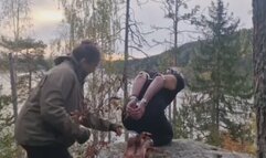 Man in steel restraints outdoor