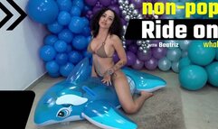 Beatriz Enjoys a Fun Ride on Her Blue Intex Whale