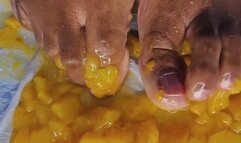 Tinas Flat Feet - Peaches Smash - A close up sensory-rich video of feet smashing ripe peaches, creating visually engaging blend of textures and sounds