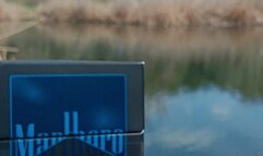 girl in latex gloves pop balloon on street